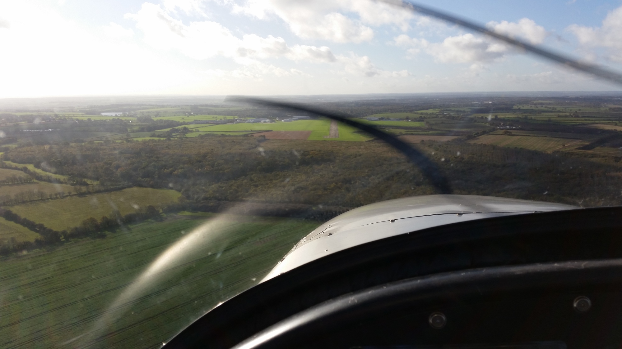 Coming in to land in a microlight